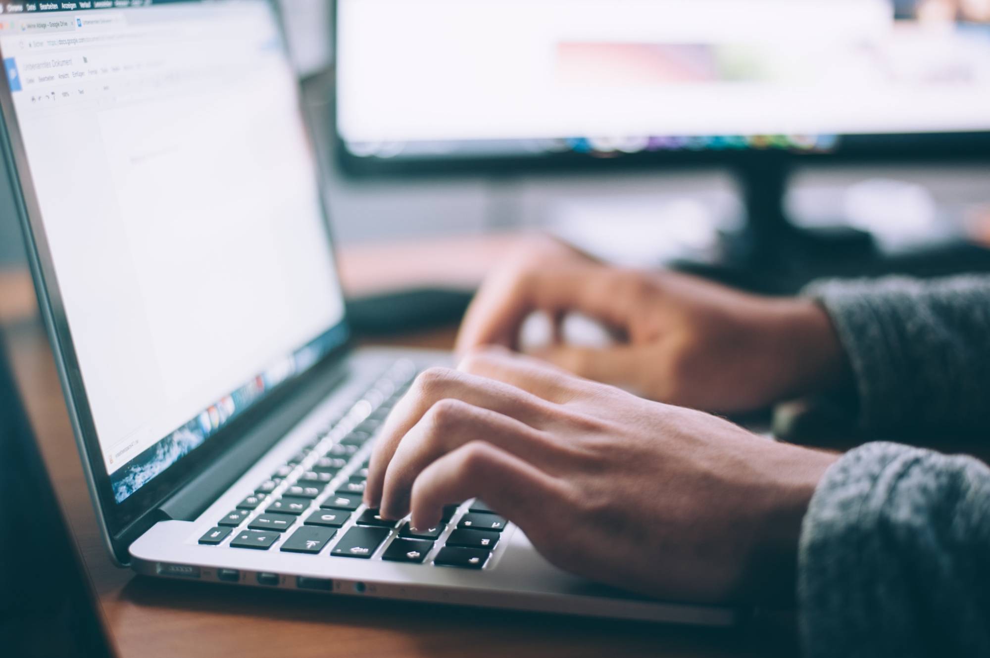 A person working on their laptop